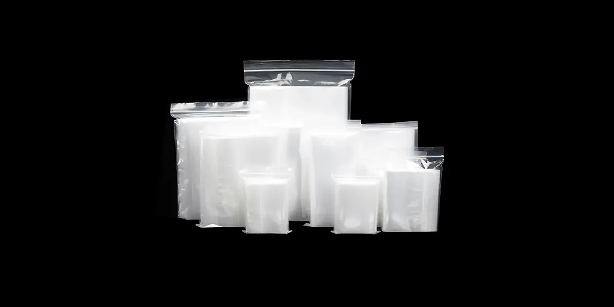 túi zipper chỉ đỏ chỉ trắng