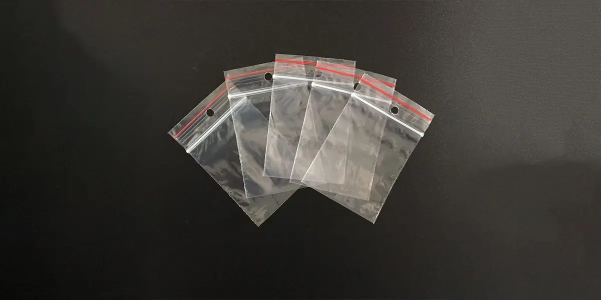 Túi zipper chỉ đỏ nhỏ