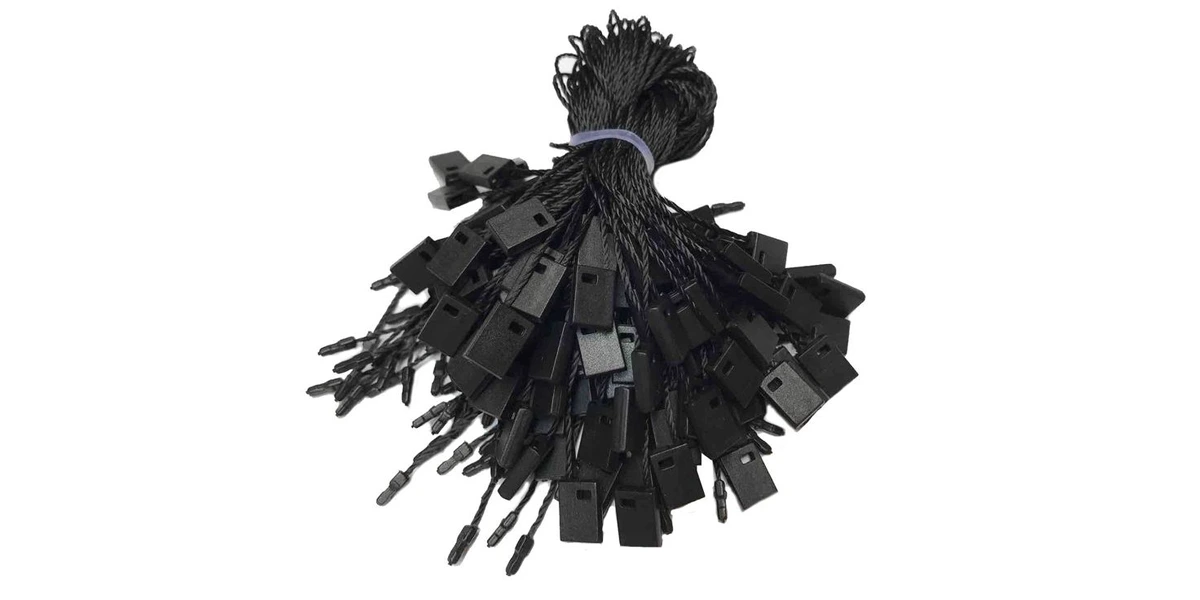 Dây treo tag quần áo là gì